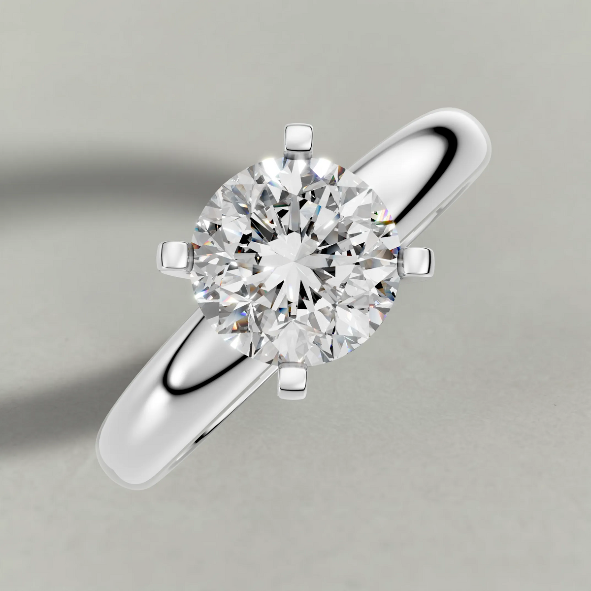 Wide Tapered Solitaire Engagement Ring (3808) in Platinum from top 3/4 angle