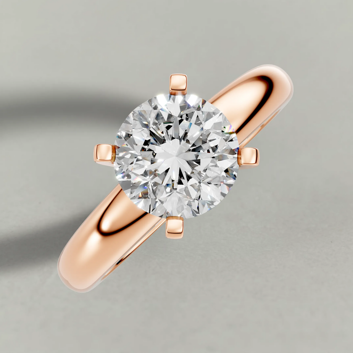 Wide Tapered Solitaire Engagement Ring (3808) in Rose Gold from top 3/4 angle