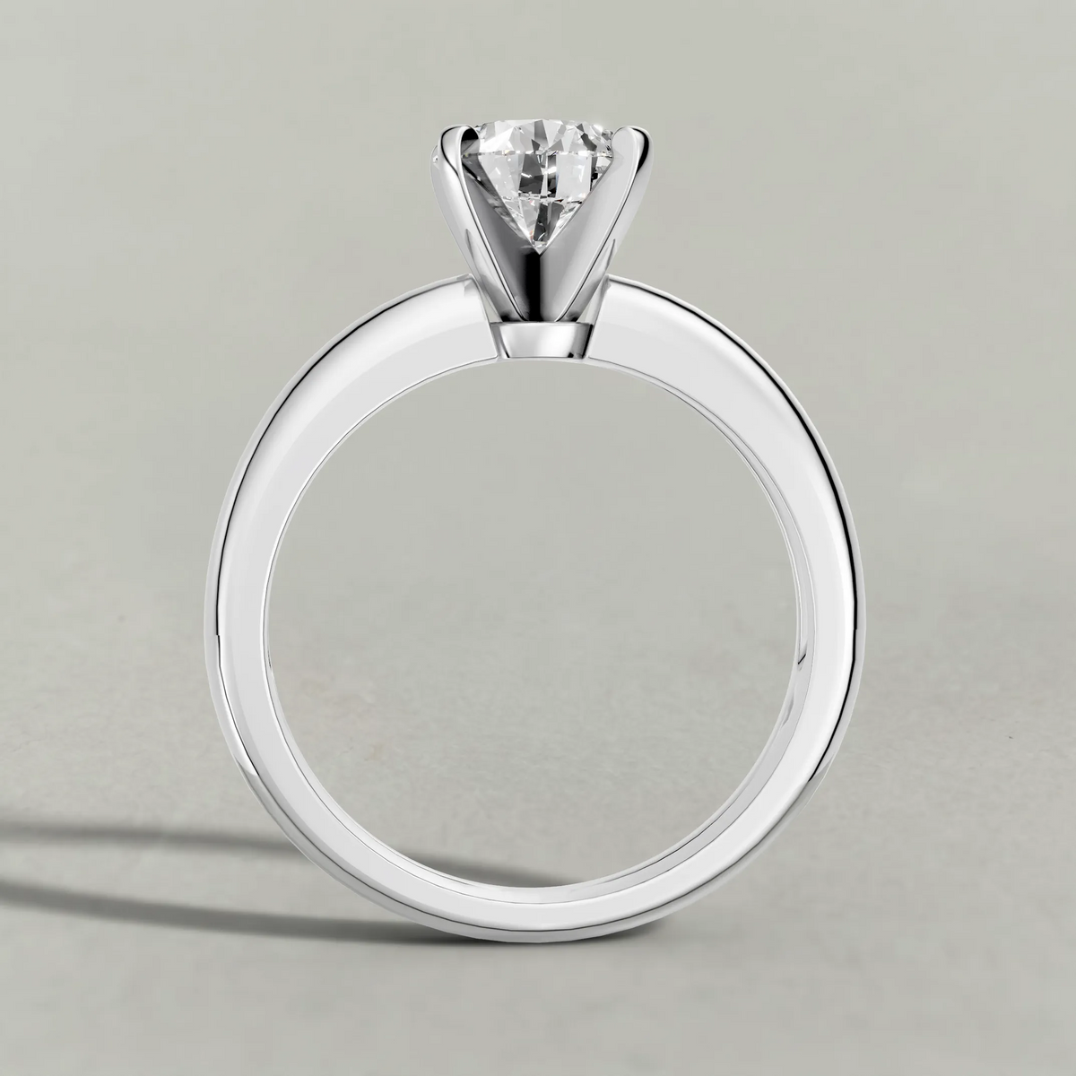 Wide Tapered Solitaire Engagement Ring (3808) in White Gold from front angle