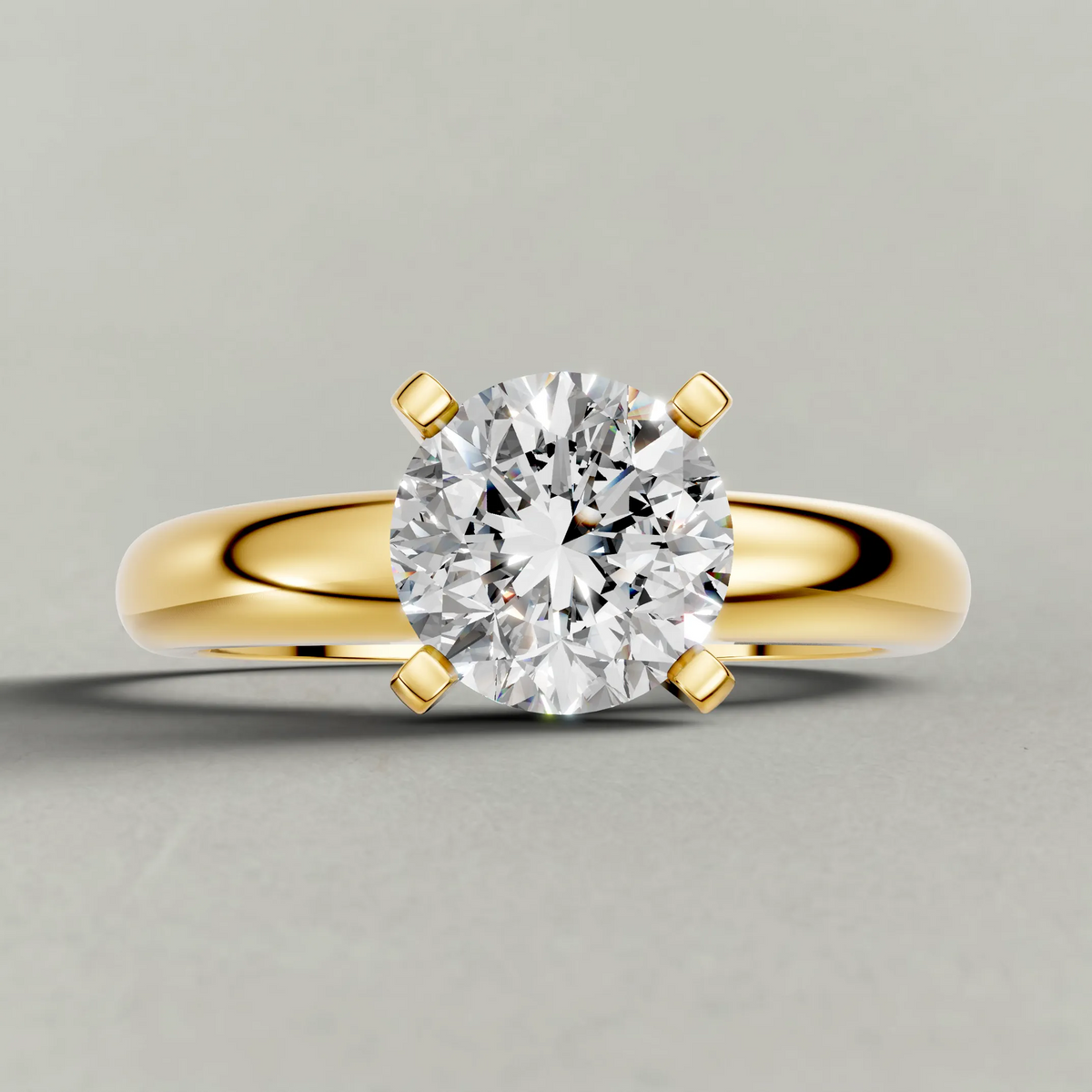 Wide Tapered Solitaire Engagement Ring (3808) in Yellow Gold zoomed in on diamond