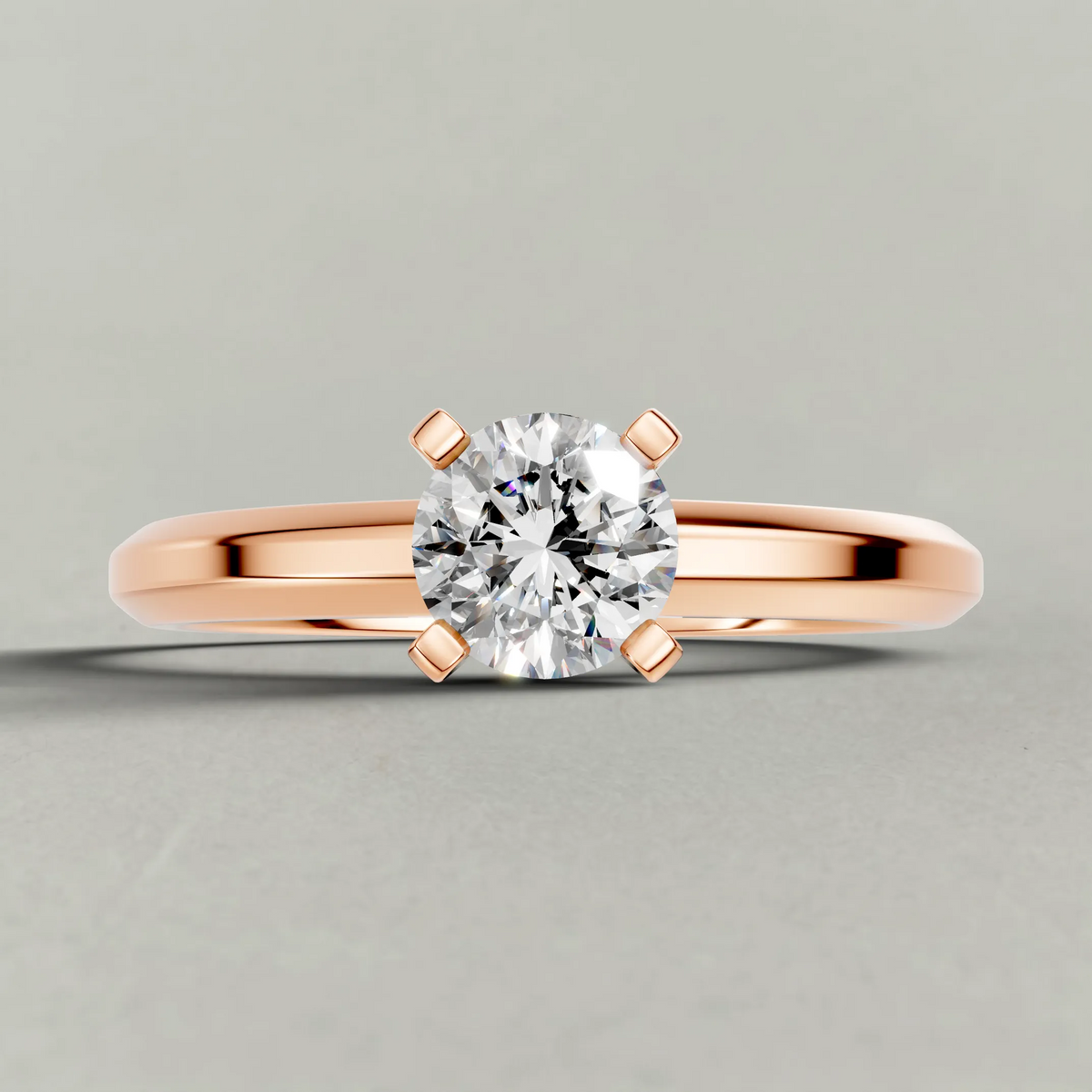 Slim Tapered Solitaire Engagement Ring (3840) in Rose Gold zoomed in on diamond
