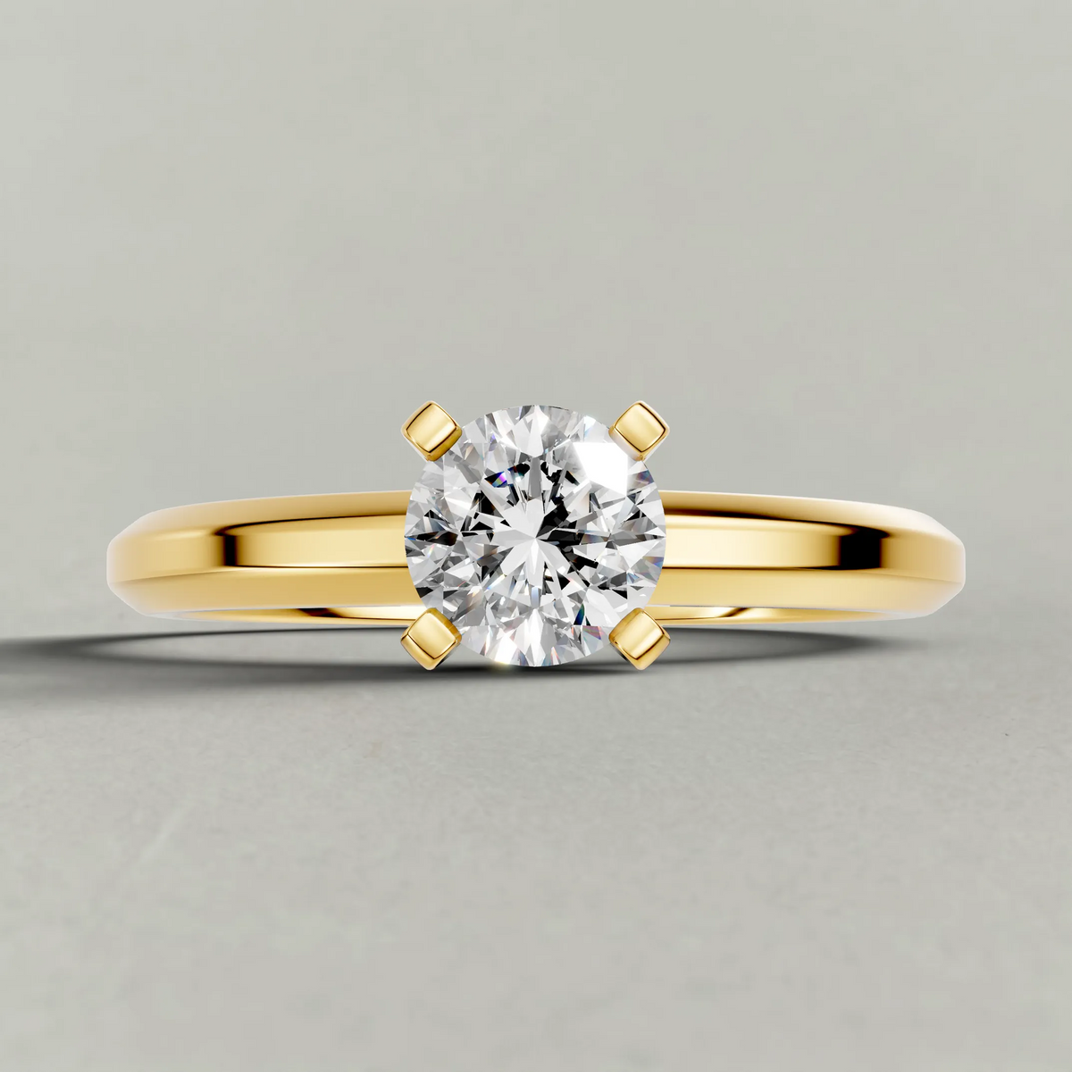 Slim Tapered Solitaire Engagement Ring (3840) in Yellow Gold zoomed in on diamond