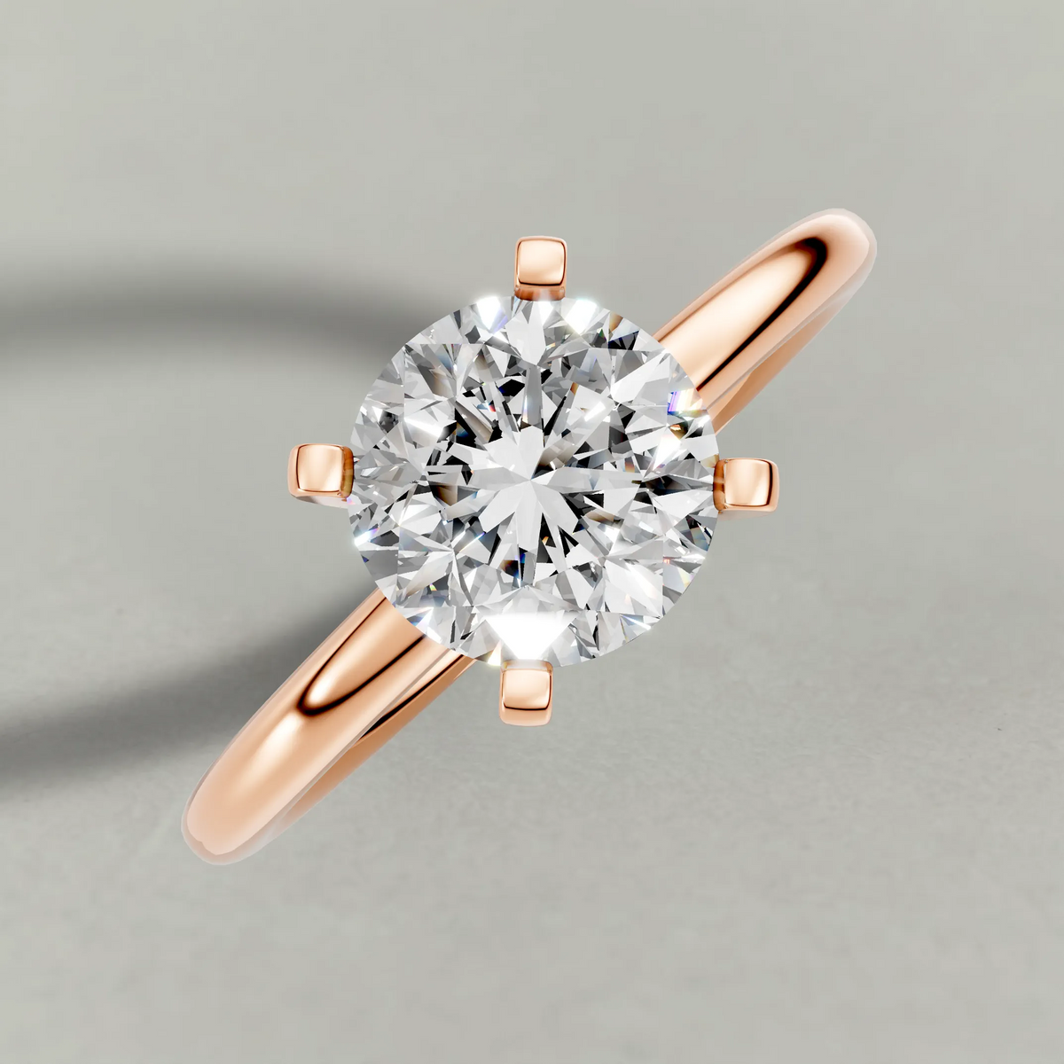 Petite Basket Solitaire Engagement Ring (3905) in Rose Gold from top 3/4 angle