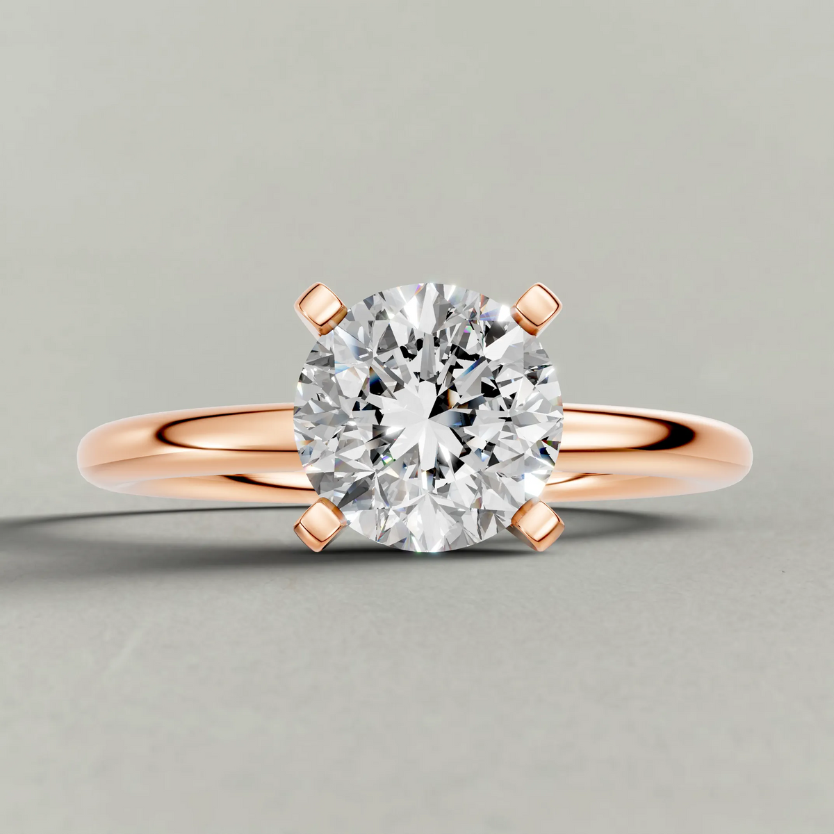 Petite Basket Solitaire Engagement Ring (3905) in Rose Gold zoomed in on diamond