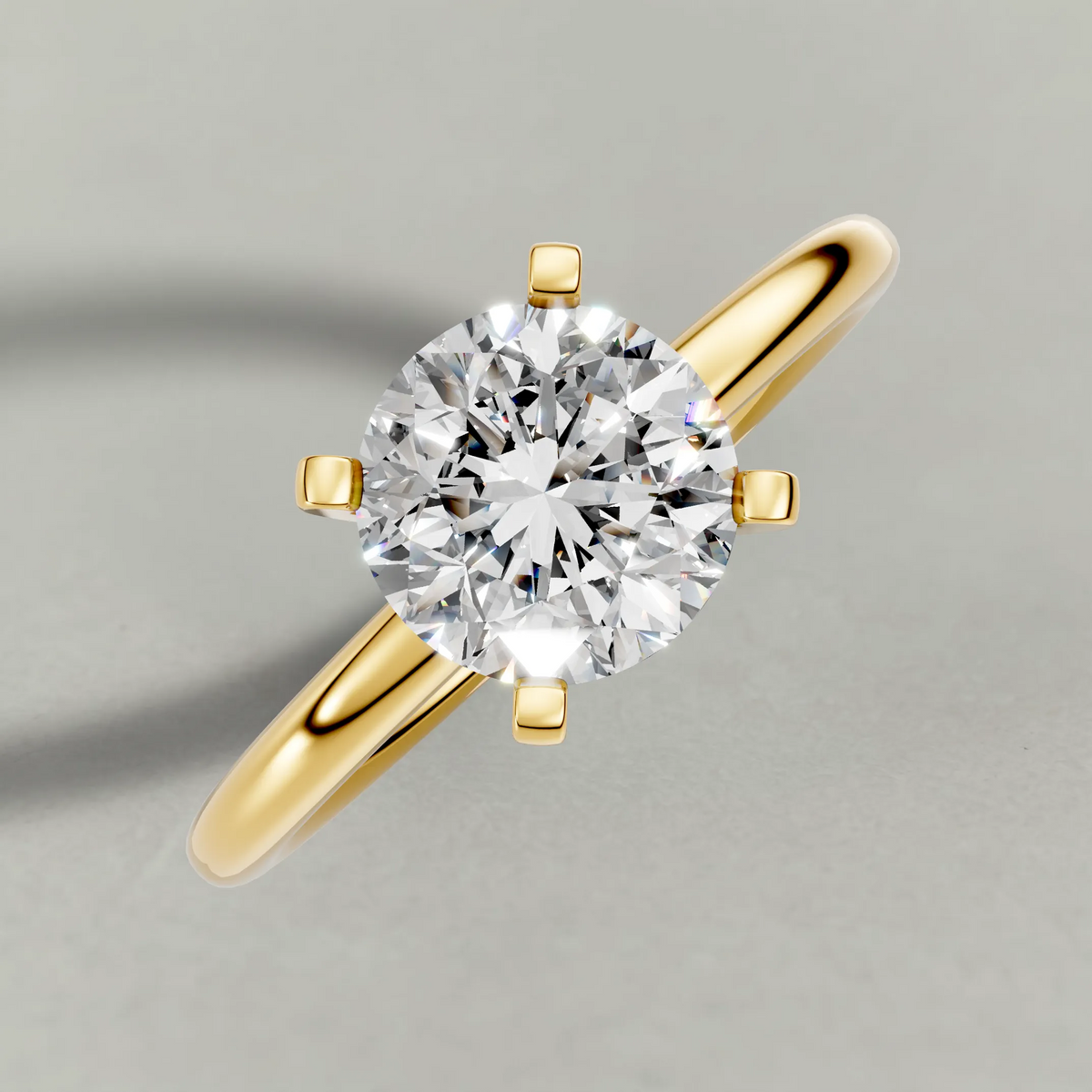 Petite Basket Solitaire Engagement Ring (3905) in Yellow Gold from top 3/4 angle