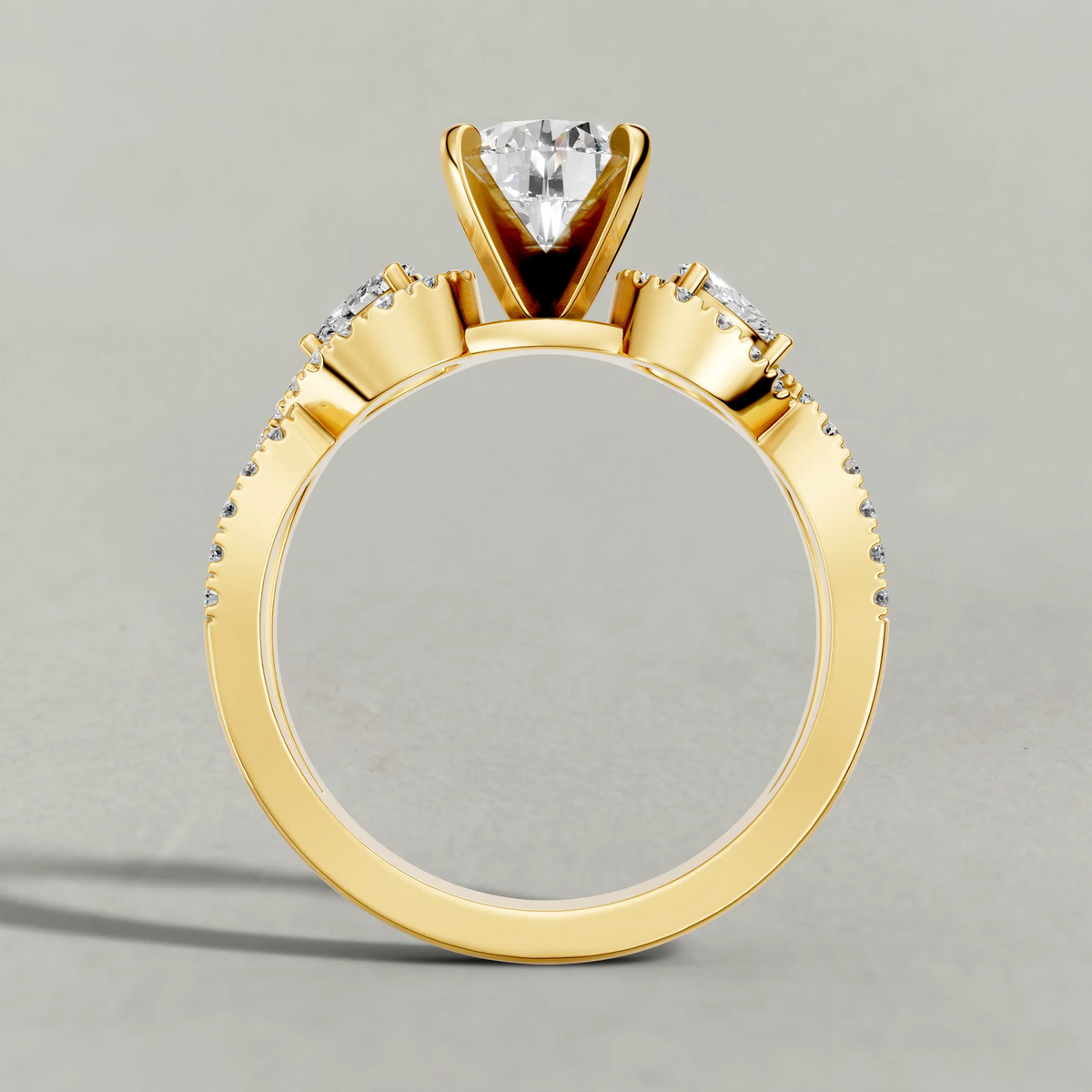 Three-Stone Pavé Twist Engagement Ring (70667) in Yellow Gold from front angle