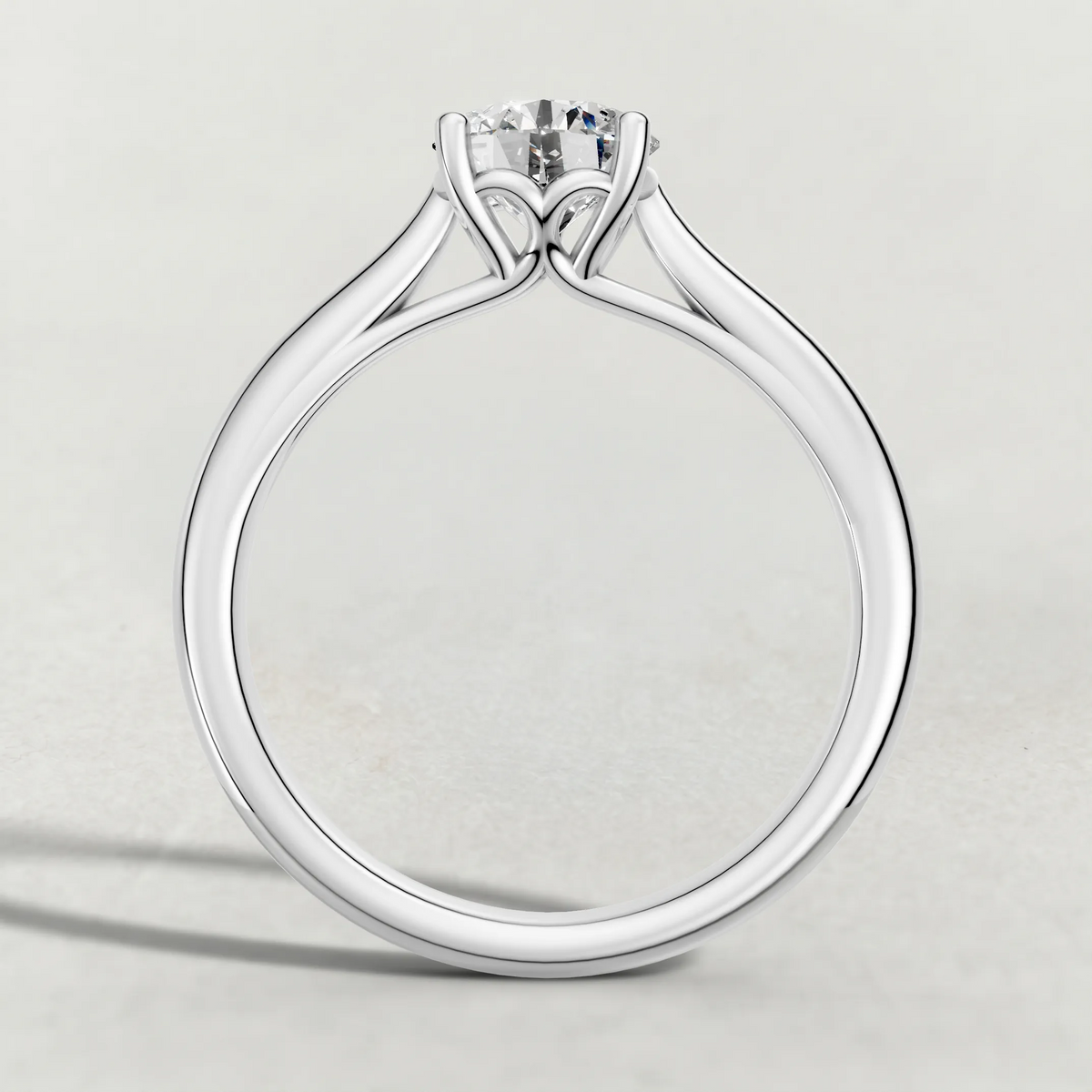 Tapered Four-Prong Solitaire Engagement Ring (70686) in Platinum from front angle
