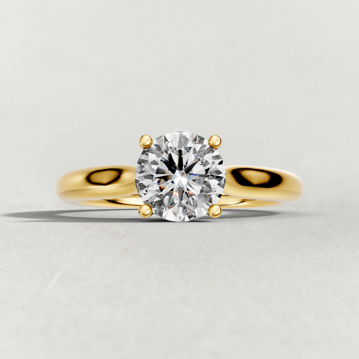 Tapered Four-Prong Solitaire Engagement Ring (70686) in Yellow Gold zoomed in on diamond