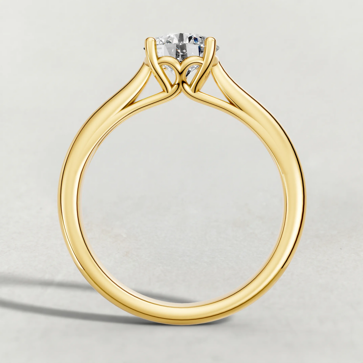 Tapered Four-Prong Solitaire Engagement Ring (70686) in Yellow Gold from front angle