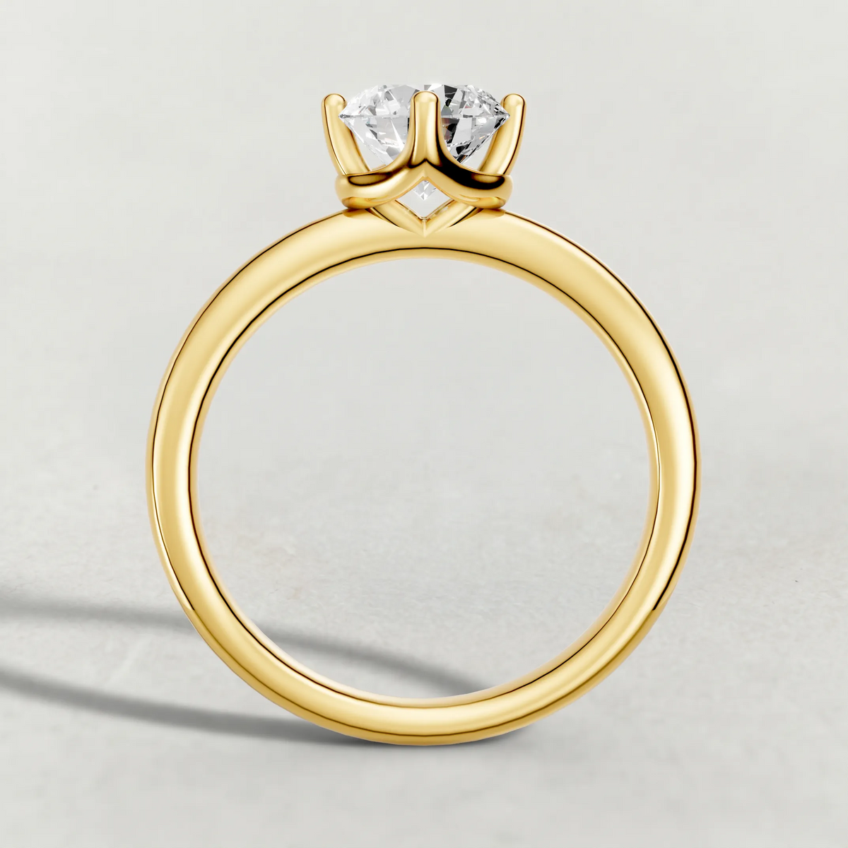 Compass-Set Solitaire Engagement Ring (70690) in Yellow Gold from front angle