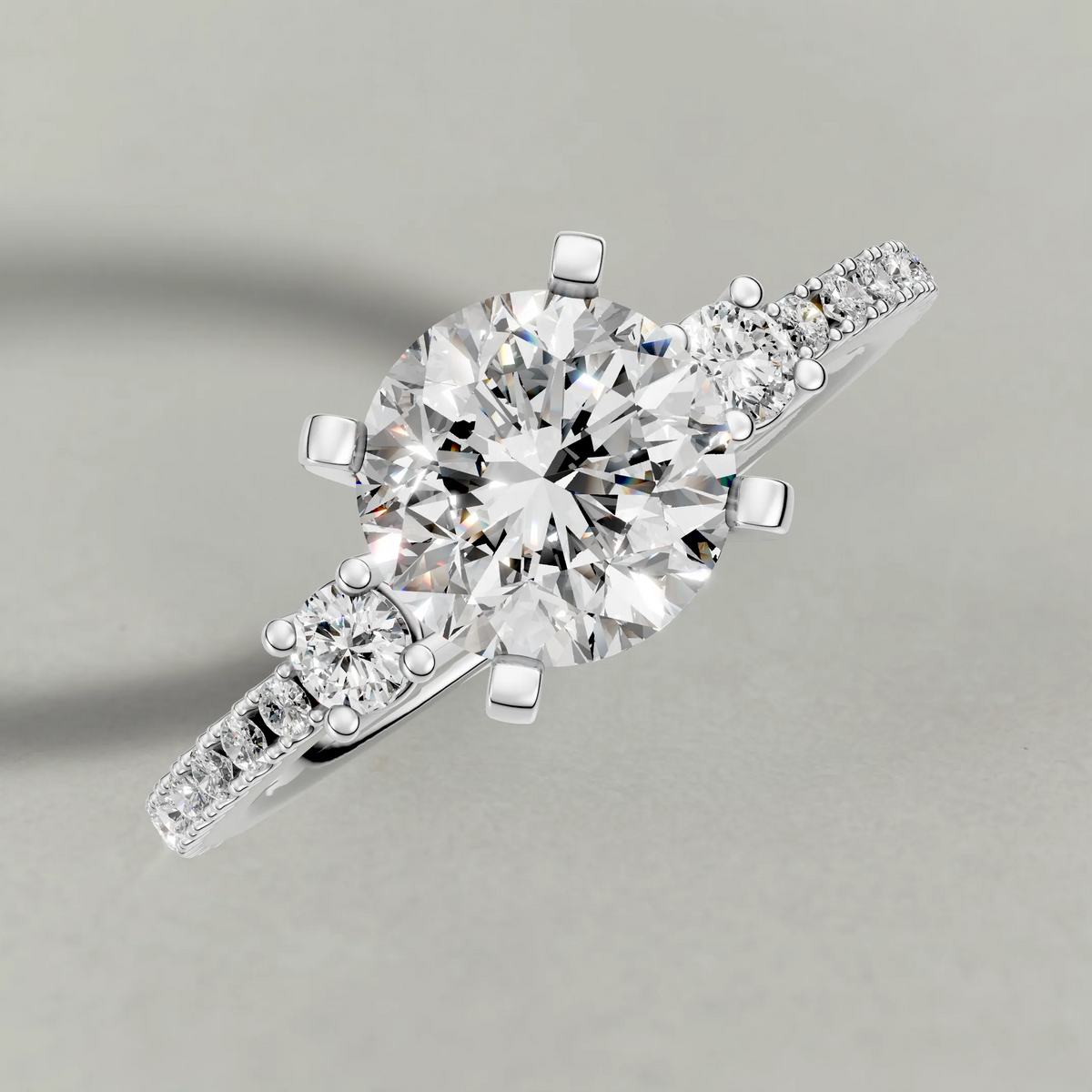 Three-Stone Pavé Engagement Ring (70857) in Platinum from top 3/4 angle