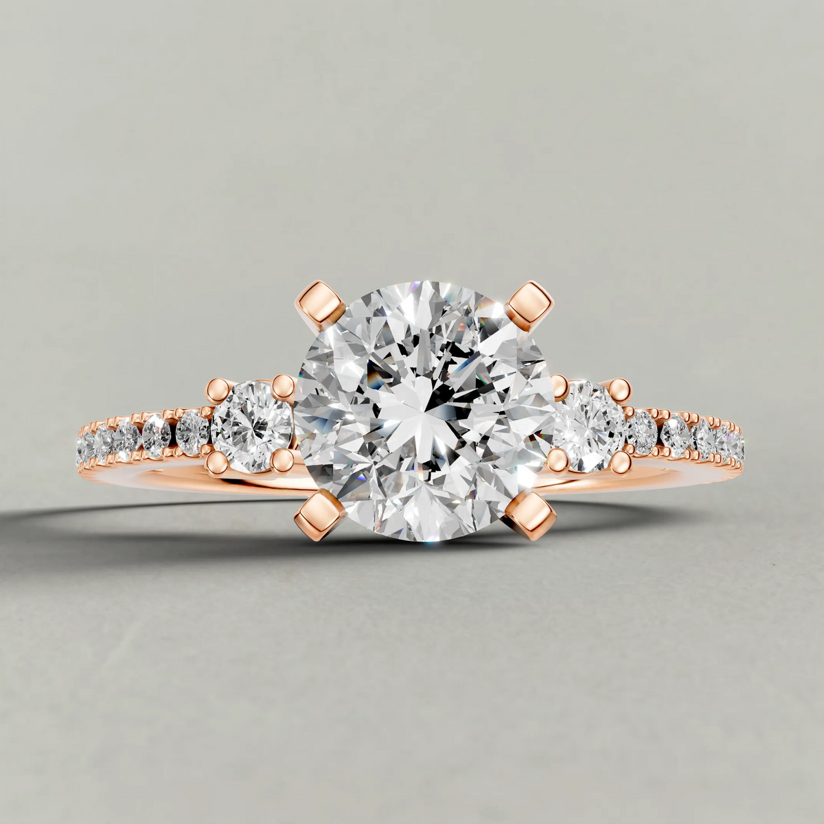 Three-Stone Pavé Engagement Ring (70857) in Rose Gold zoomed in on diamond