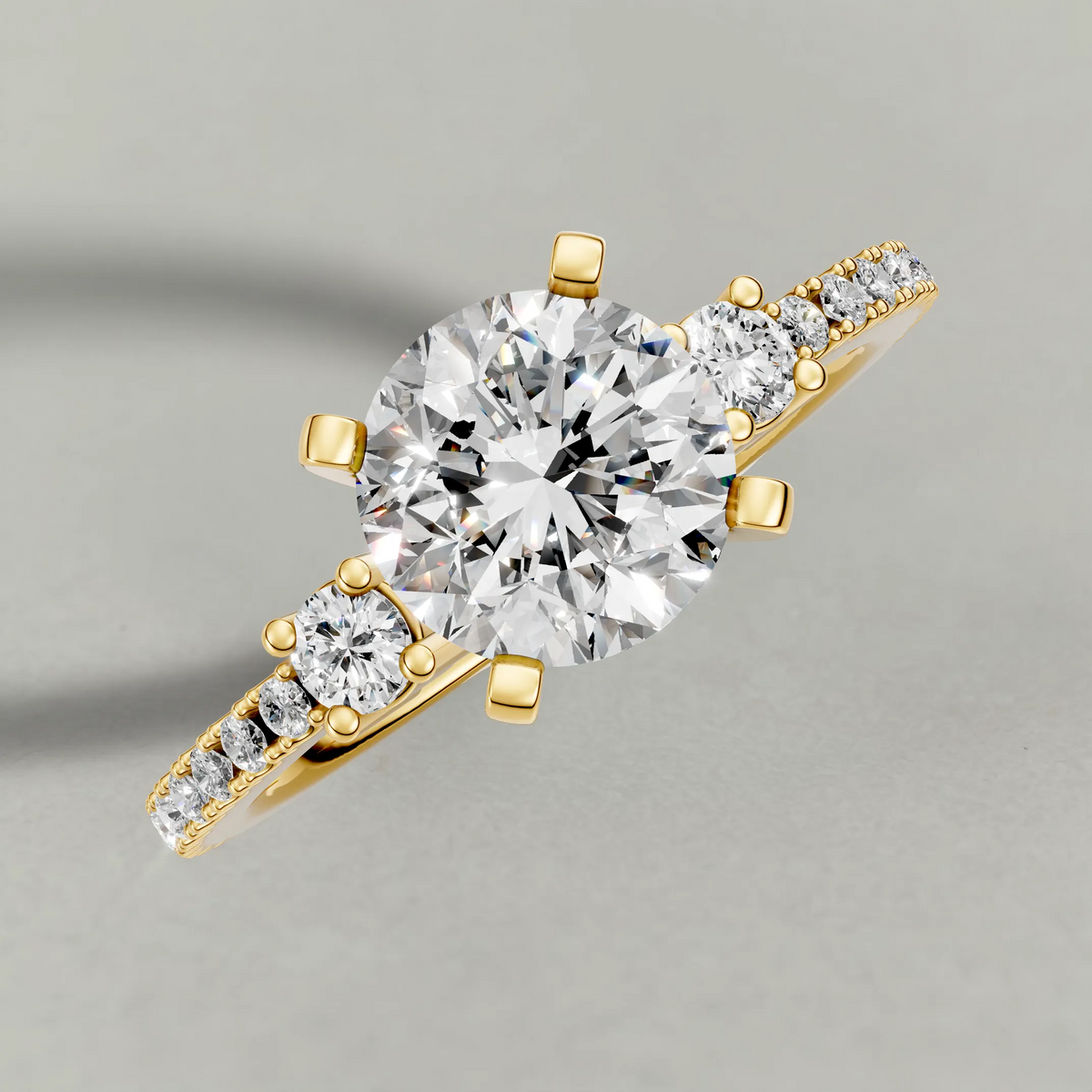 Three-Stone Pavé Engagement Ring (70857) in Yellow Gold from top 3/4 angle