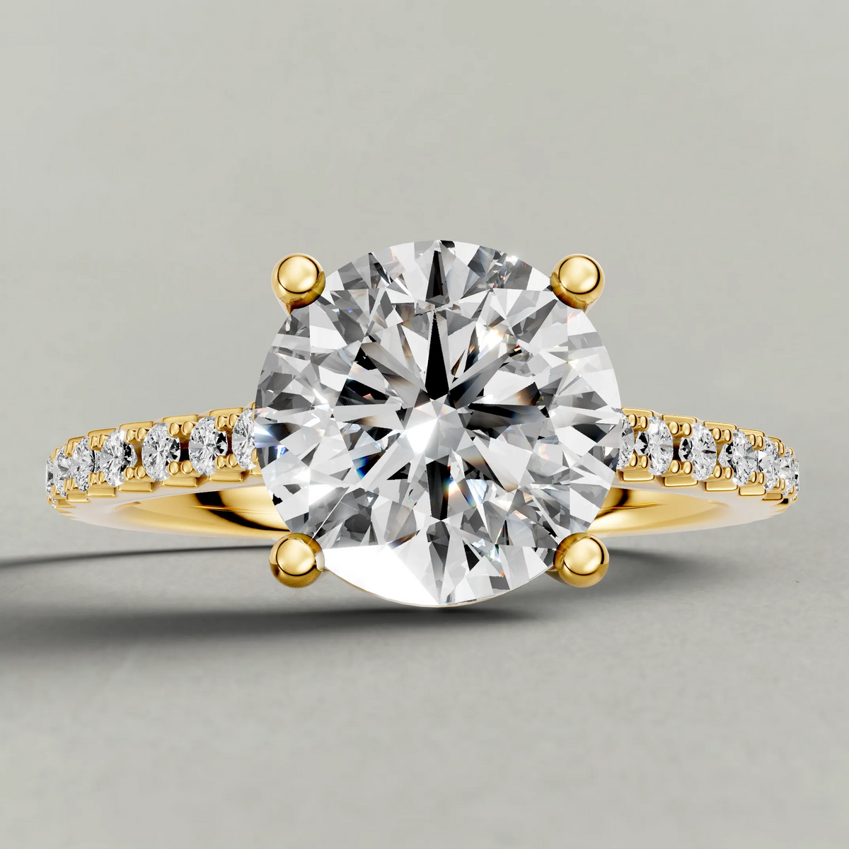 Four-Prong Pavé Band Engagement Ring (70872) in Yellow Gold zoomed in on diamond
