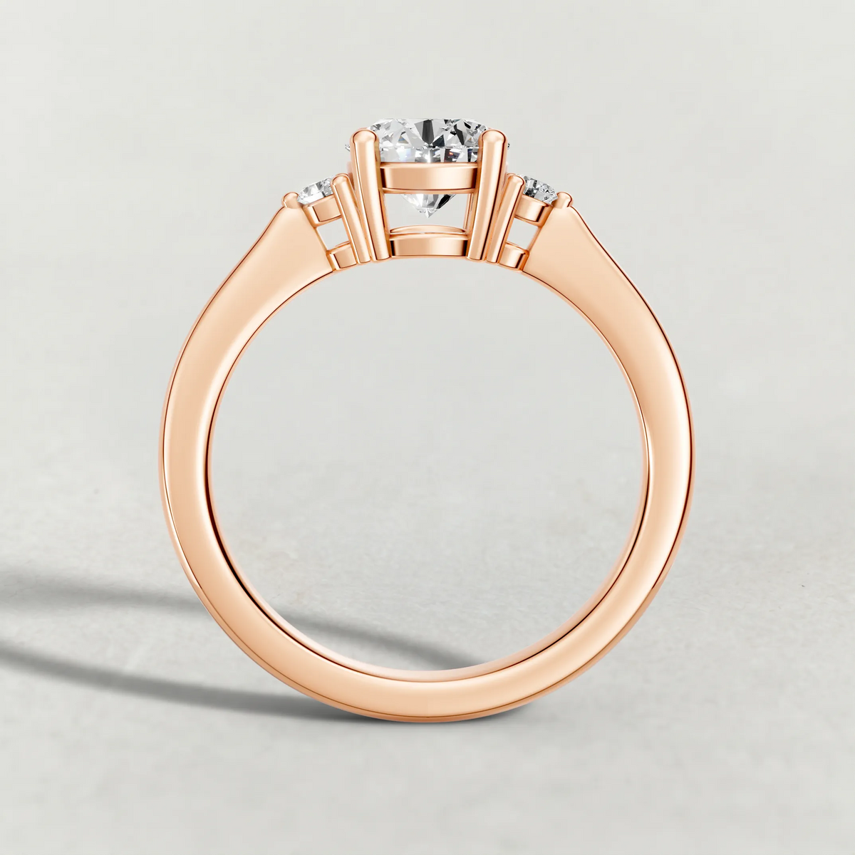 Diamond Accent Shoulder Solitaire Engagement Ring (70934) in Rose Gold from front angle