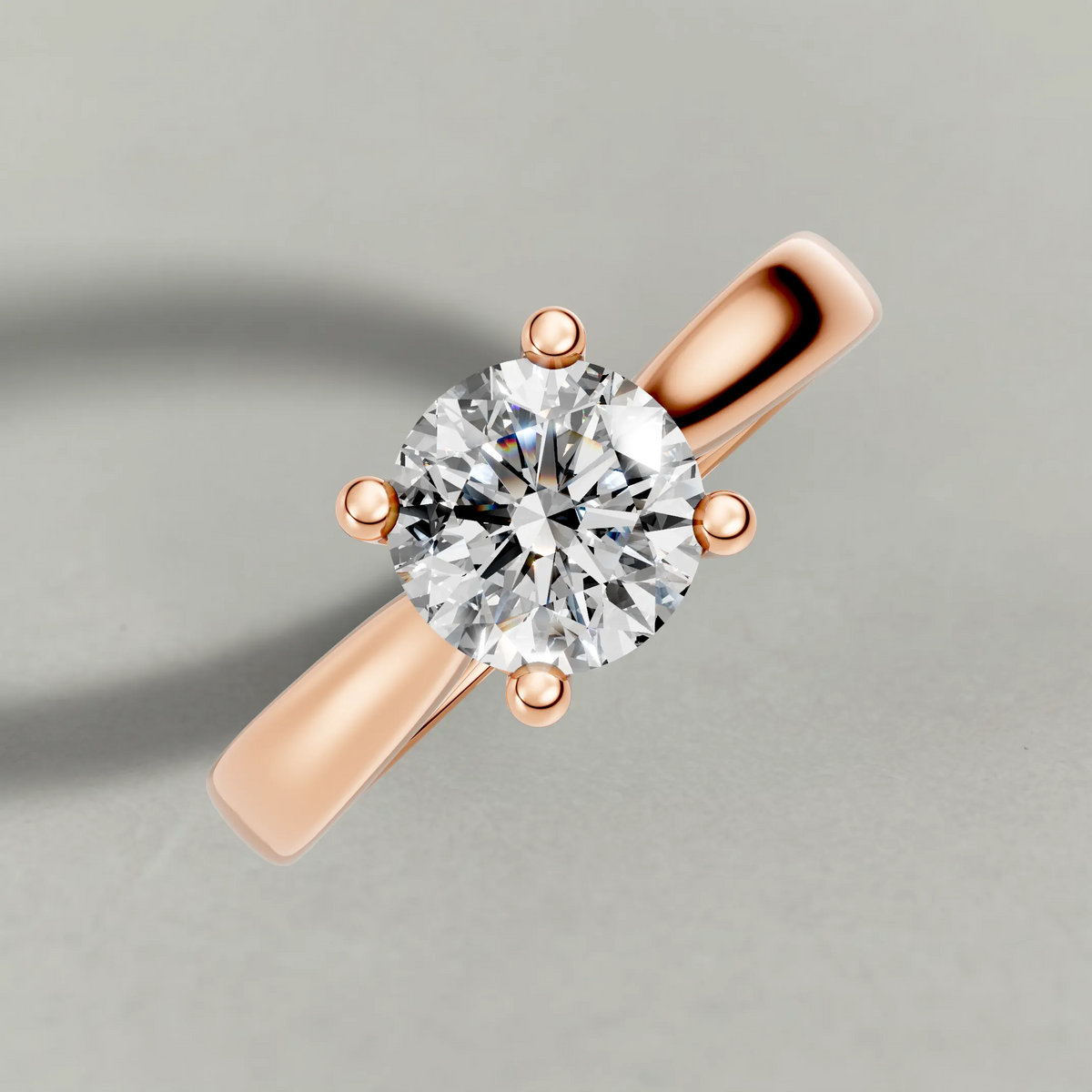Forked Shoulder Solitaire Engagement Ring (70980) in Rose Gold from top 3/4 angle