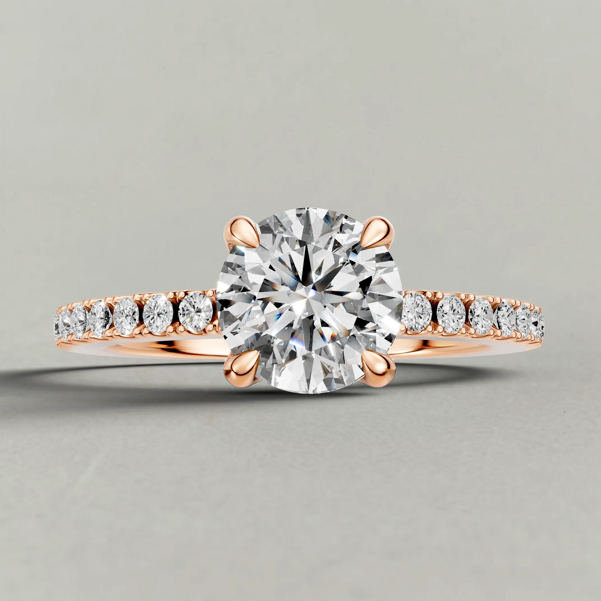 Cathedral Pavé Shoulder Engagement Ring (71116) in Rose Gold zoomed in on diamond