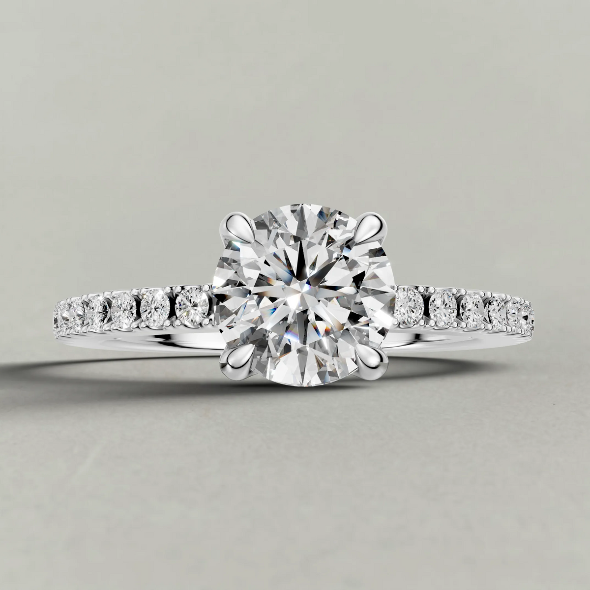 Cathedral Pavé Shoulder Engagement Ring (71116) in White Gold zoomed in on diamond