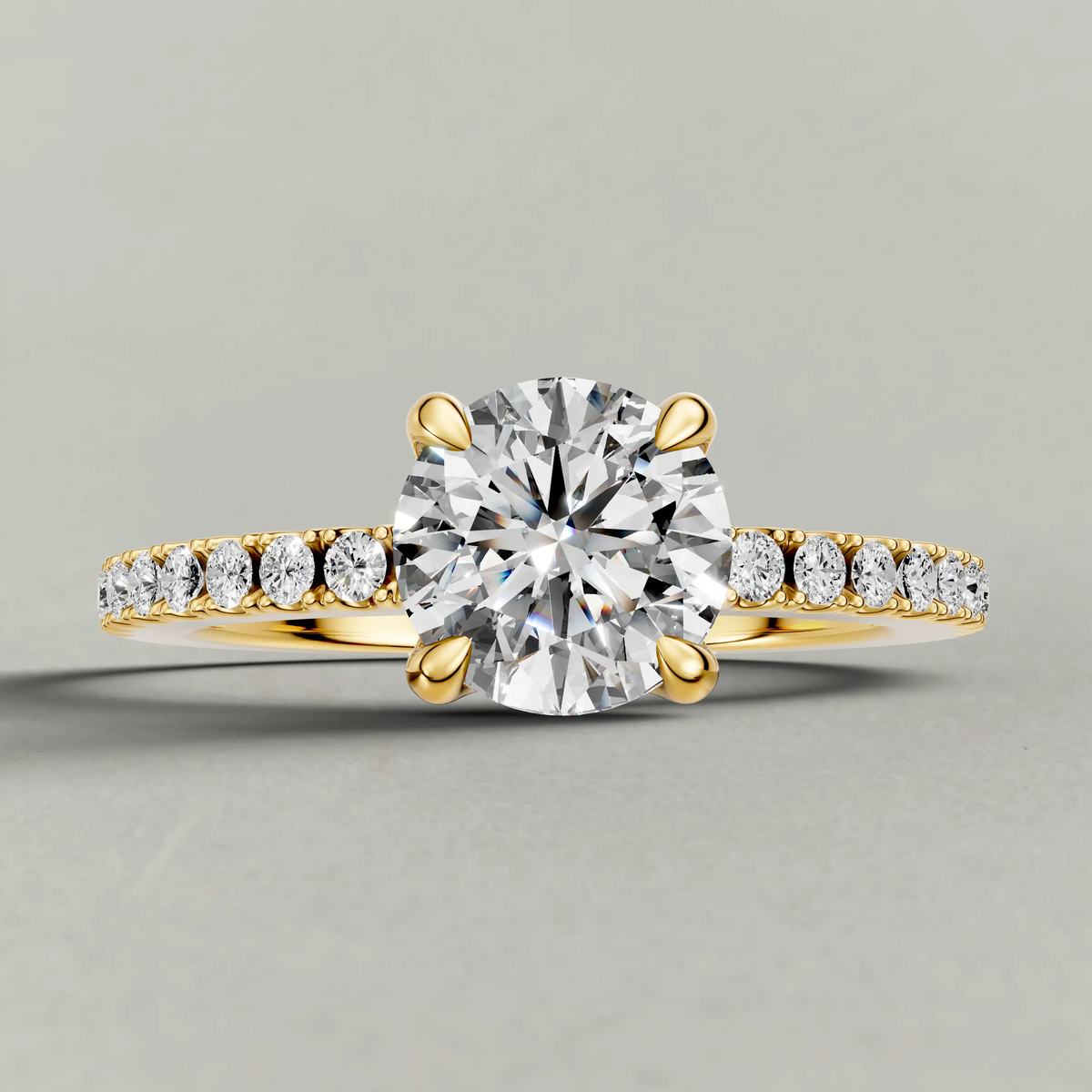 Cathedral Pavé Shoulder Engagement Ring (71116) in Yellow Gold zoomed in on diamond