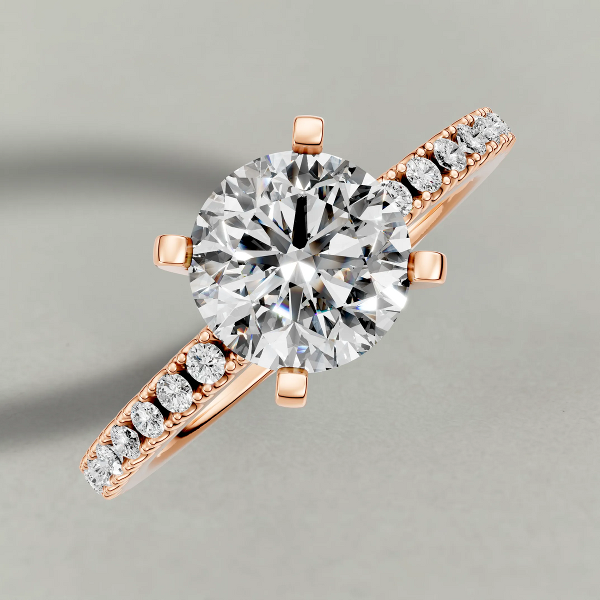 Four-Prong Pavé Shoulder Engagement Ring (71118) in Rose Gold from top 3/4 angle