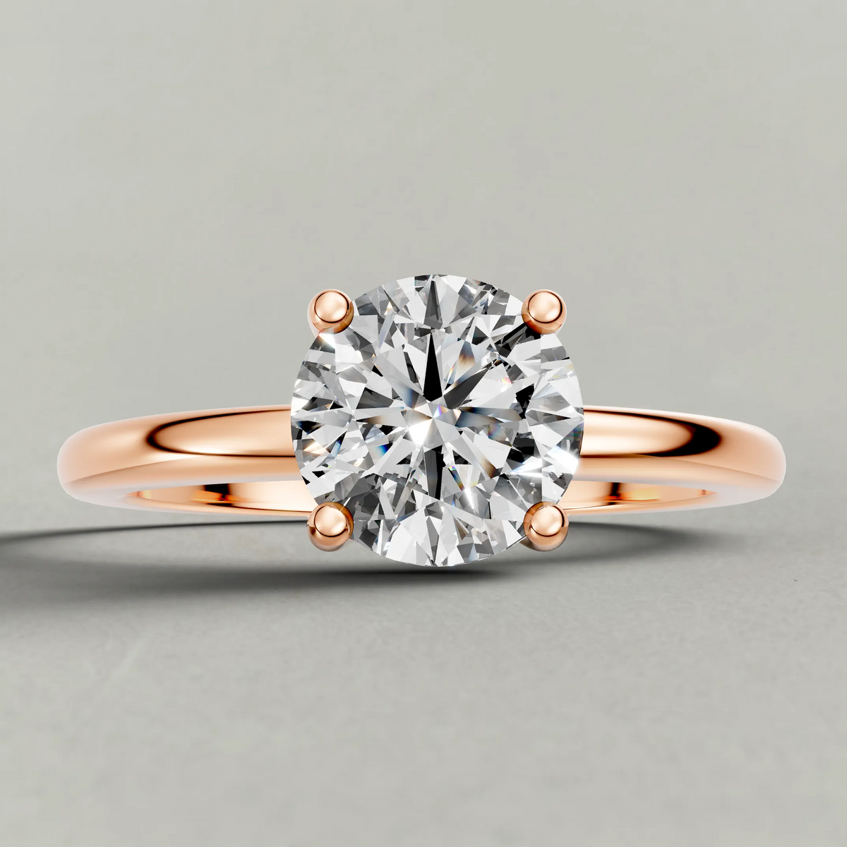 Raised Basket Solitaire Engagement Ring (71412) in Rose Gold zoomed in on diamond
