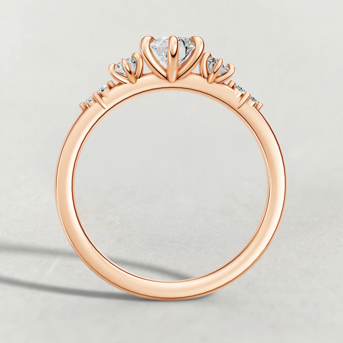 Graduated Side-Stone Engagement Ring (72084) in Rose Gold from front angle