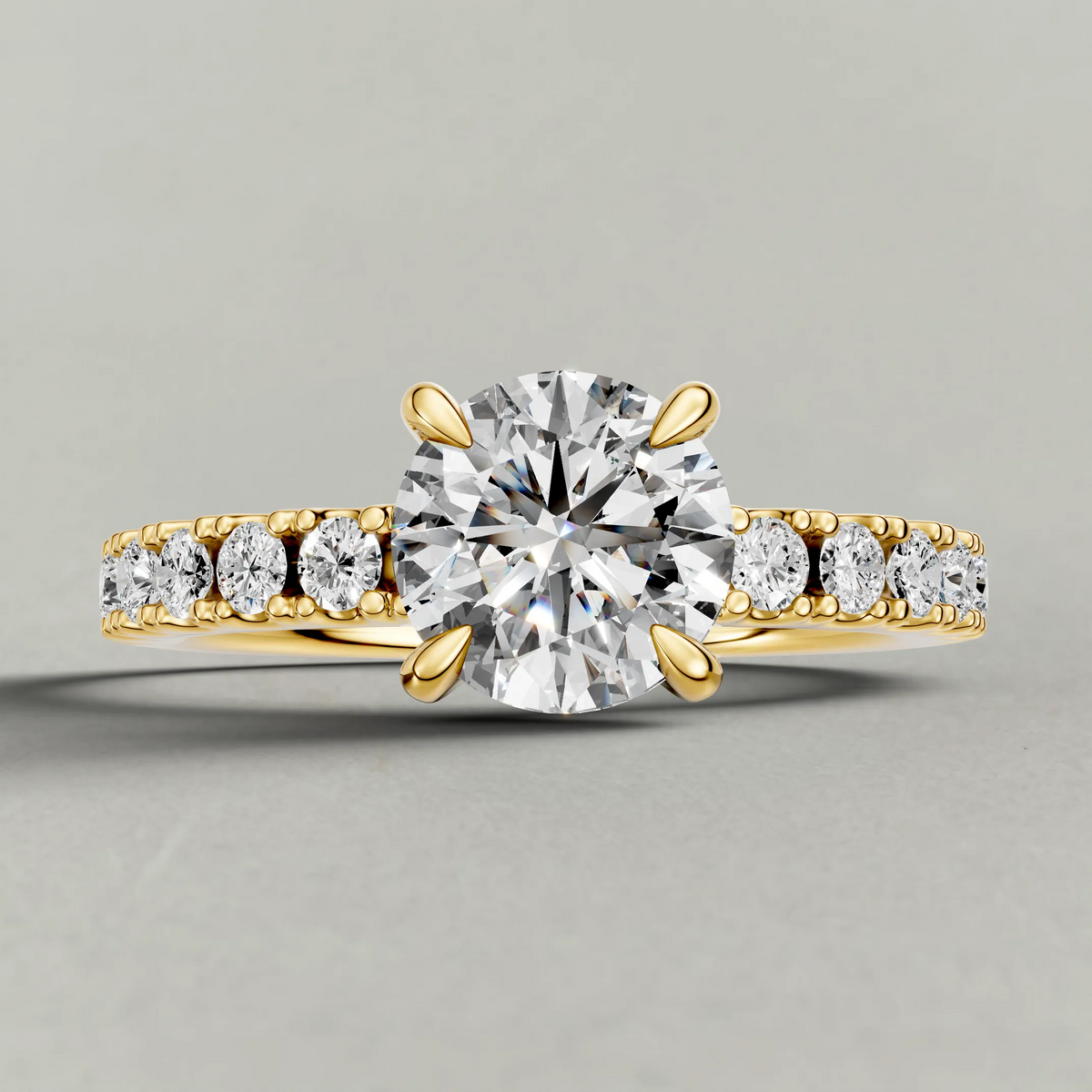 Shared-Prong Pavé Shoulder Engagement Ring (72222) in Yellow Gold zoomed in on diamond
