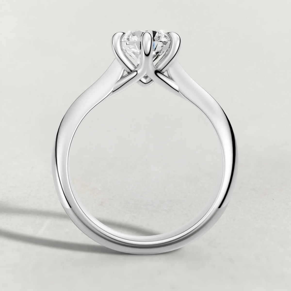 Curved Cathedral Solitaire Engagement Ring (72233) in Platinum from front angle