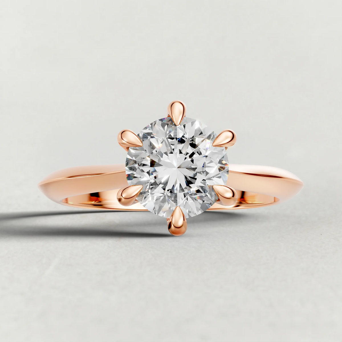 Curved Cathedral Solitaire Engagement Ring (72233) in Rose Gold zoomed in on diamond