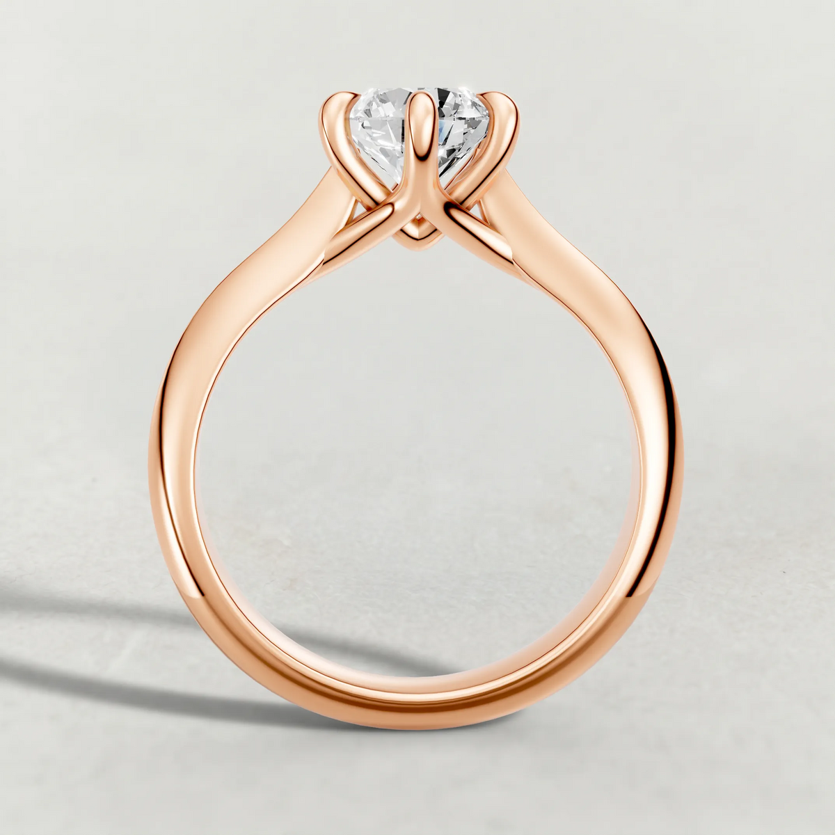 Curved Cathedral Solitaire Engagement Ring (72233) in Rose Gold from front angle