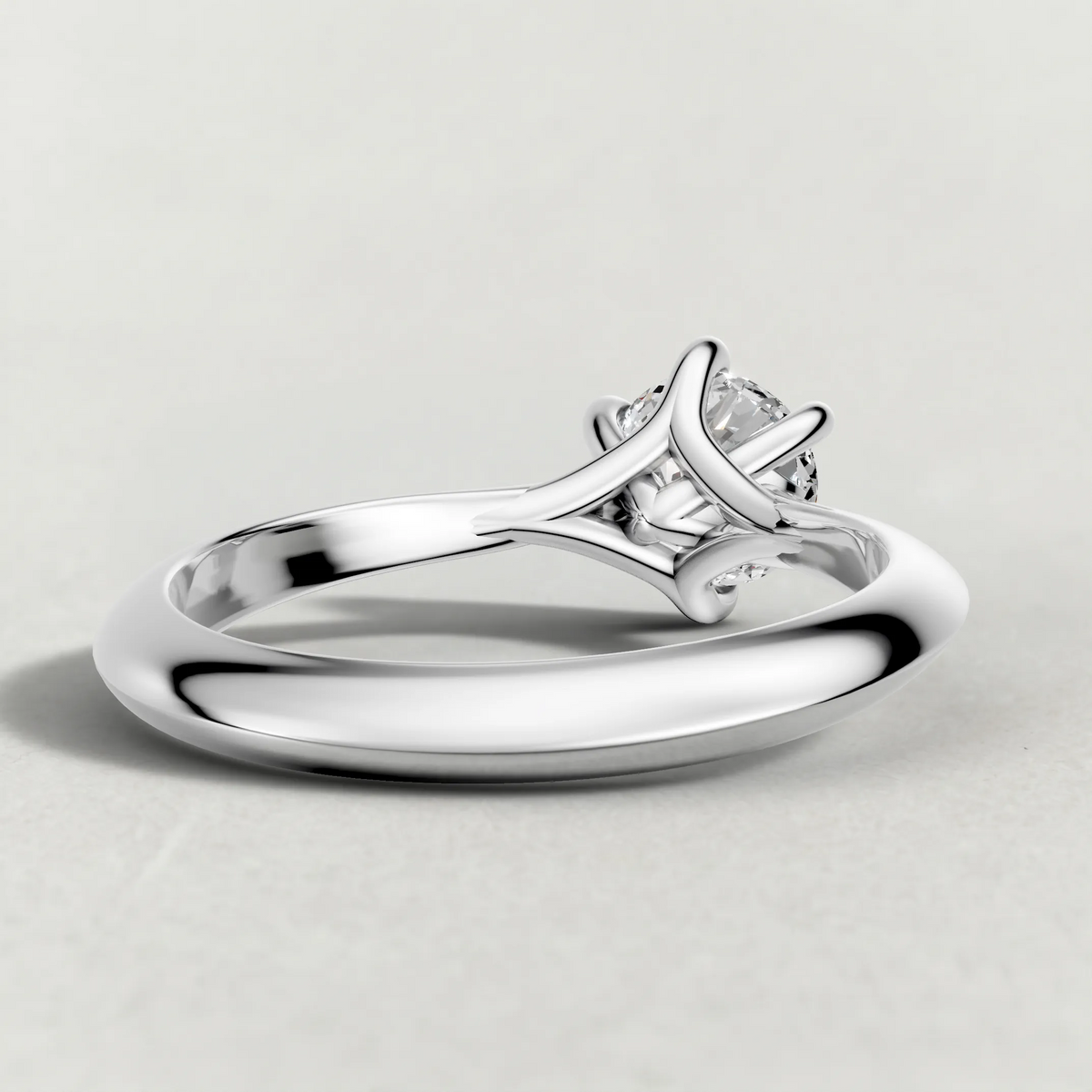 Curved Cathedral Solitaire Engagement Ring (72233) in White Gold from back angle