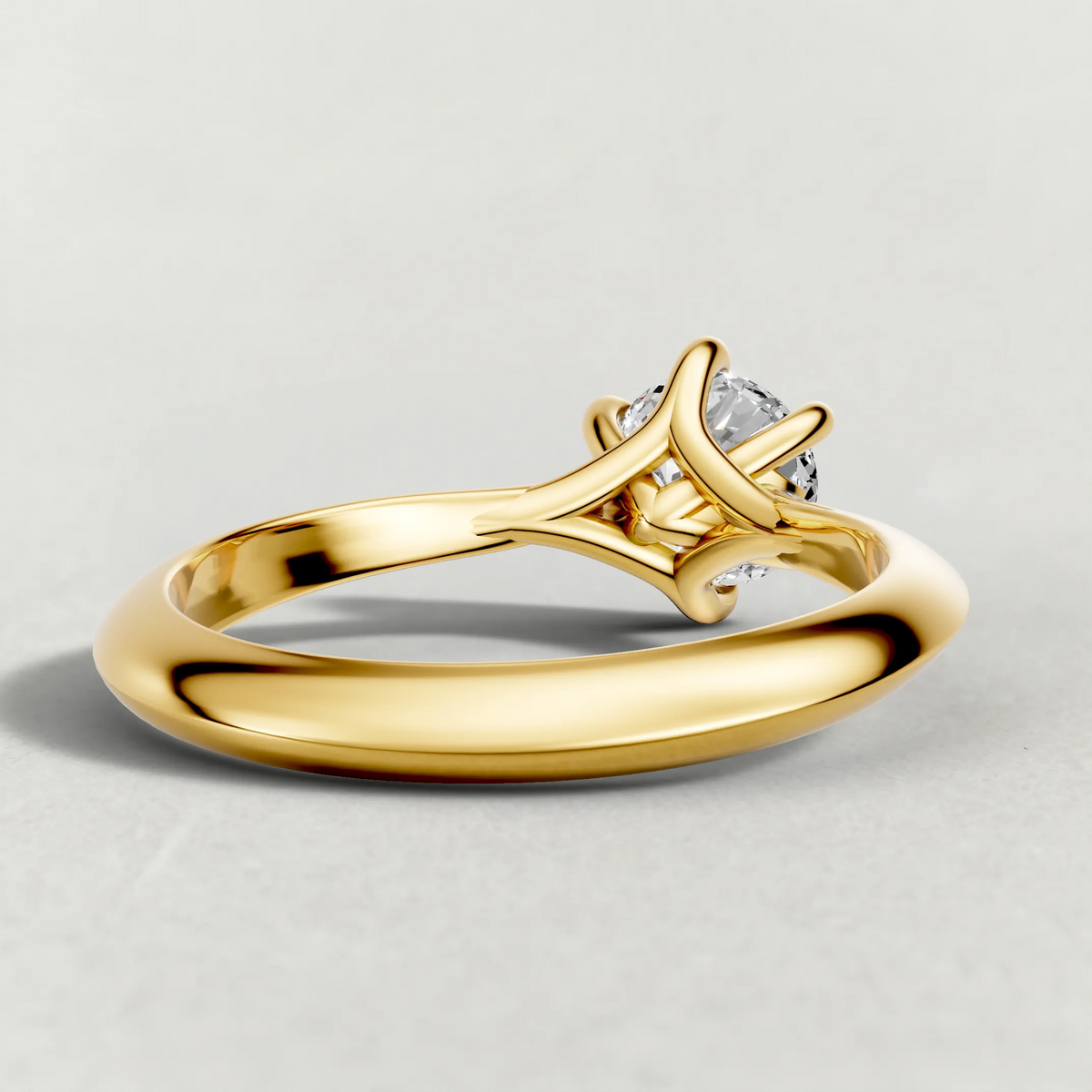 Curved Cathedral Solitaire Engagement Ring (72233) in Yellow Gold from back angle