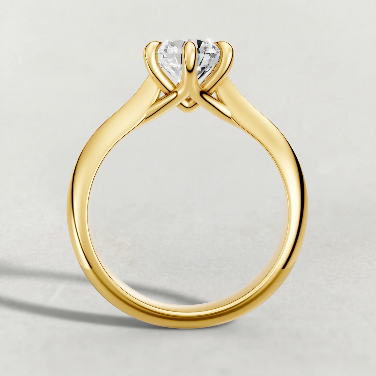 Curved Cathedral Solitaire Engagement Ring (72233) in Yellow Gold from front angle