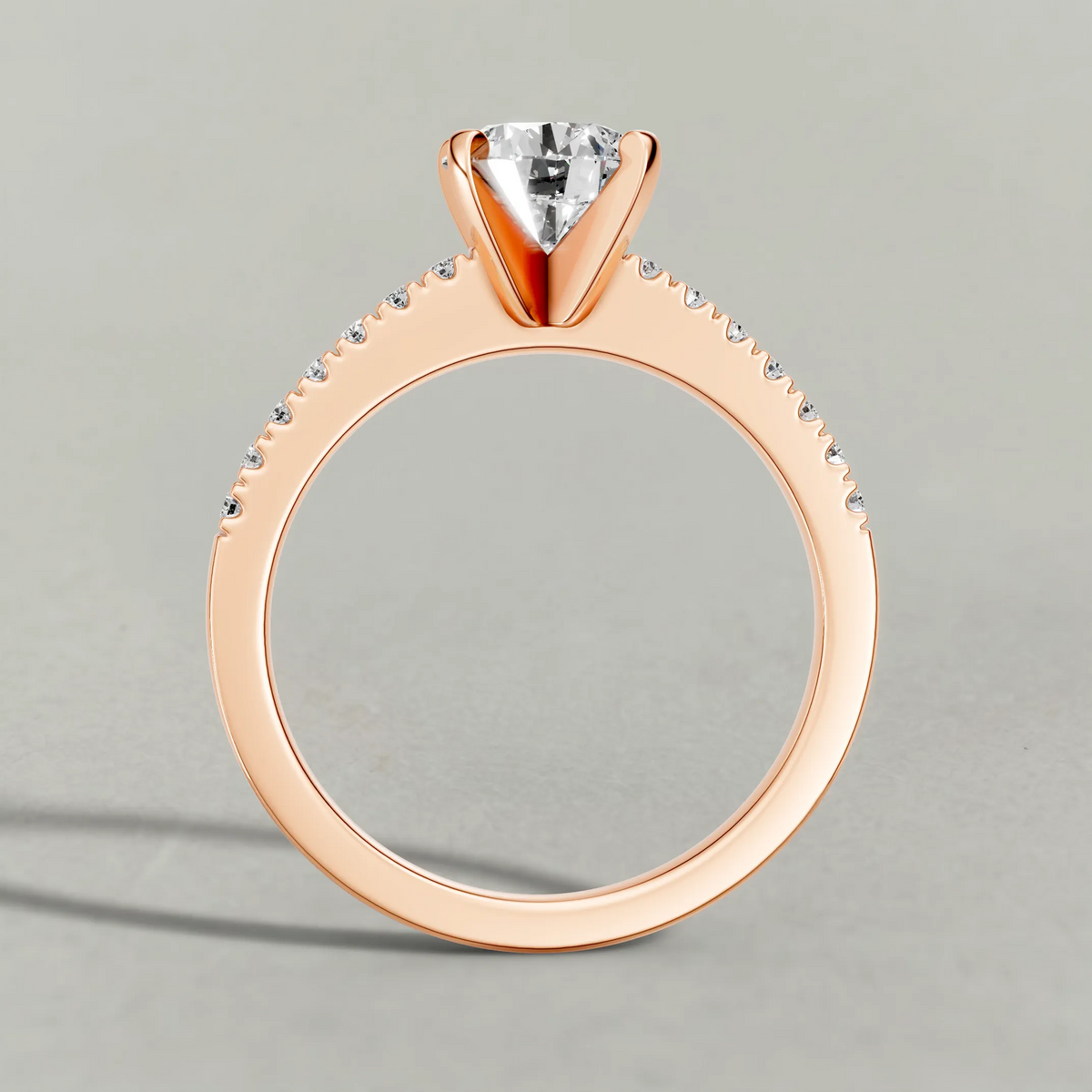 Tapered Pavé Shoulder Engagement Ring (7504) in Rose Gold from front angle