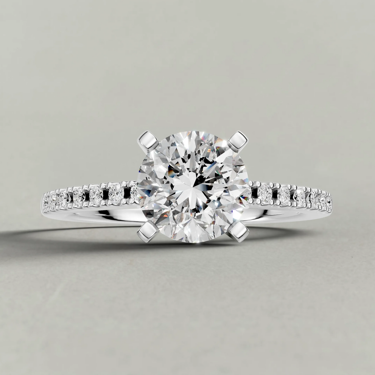 Tapered Pavé Shoulder Engagement Ring (7504) in White Gold zoomed in on diamond