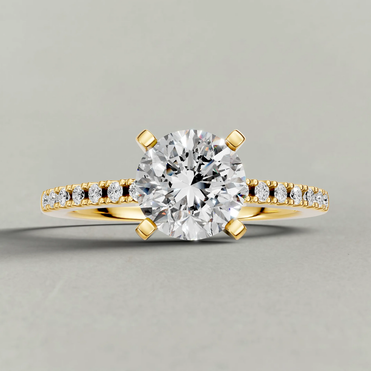 Tapered Pavé Shoulder Engagement Ring (7504) in Yellow Gold zoomed in on diamond