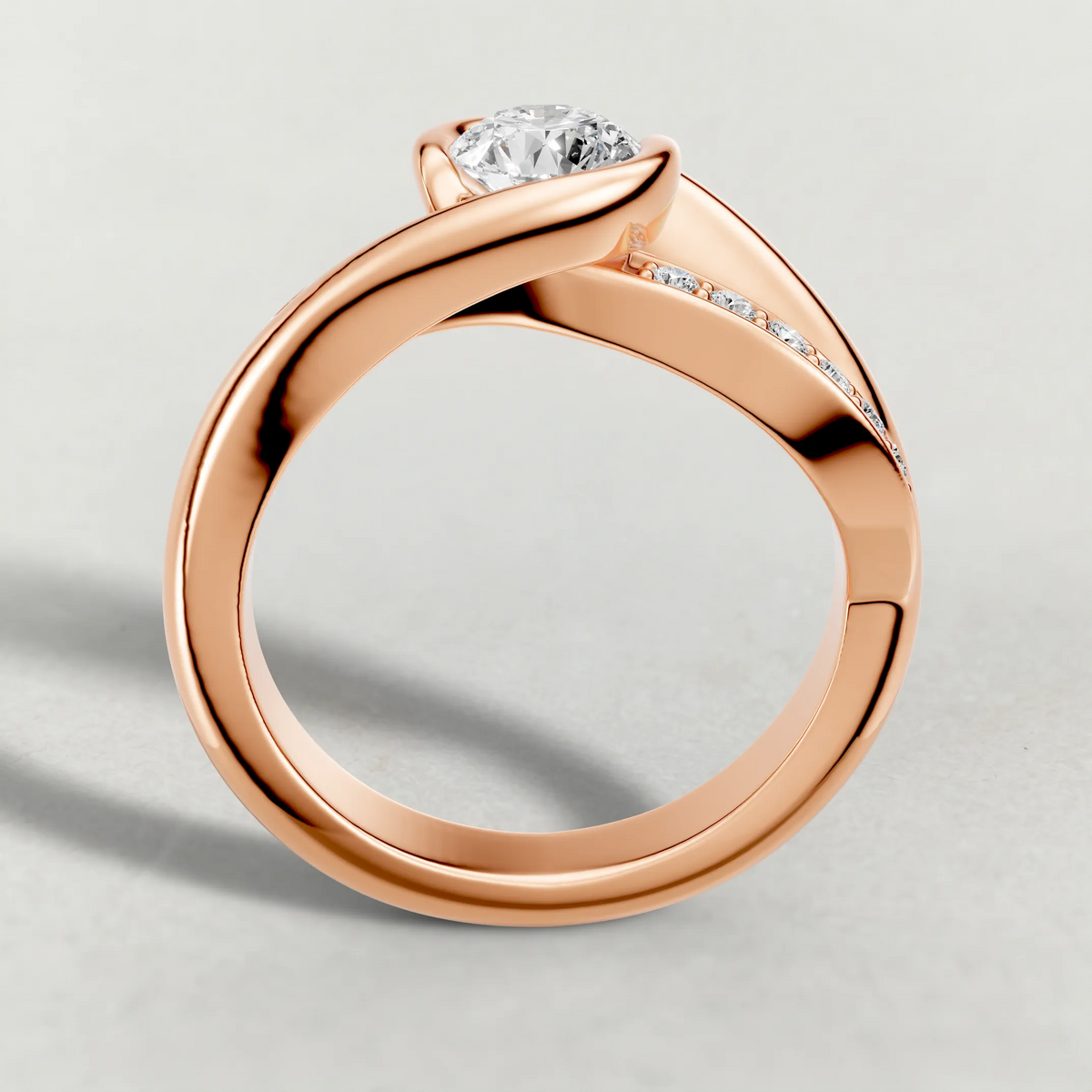 Half-Bezel Twist Engagement Ring (7544) in Rose Gold from front angle