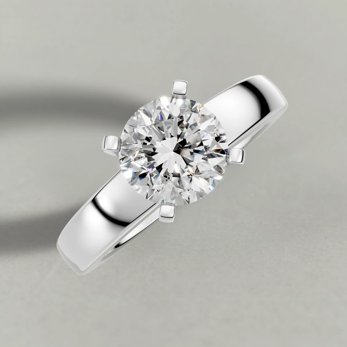 Elevated Four-Prong Solitaire Engagement Ring (7581) in White Gold from top 3/4 angle
