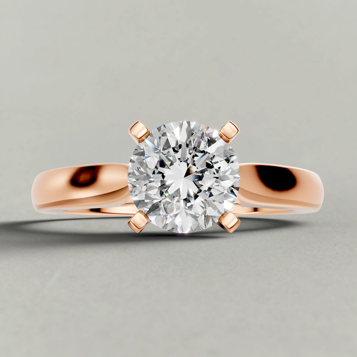 Tapered Cathedral Solitaire Engagement Ring (7587) in Rose Gold zoomed in on diamond
