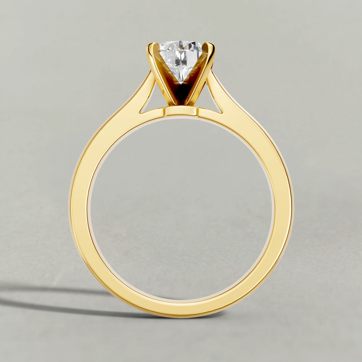 Tapered Cathedral Solitaire Engagement Ring (7587) in Yellow Gold from front angle