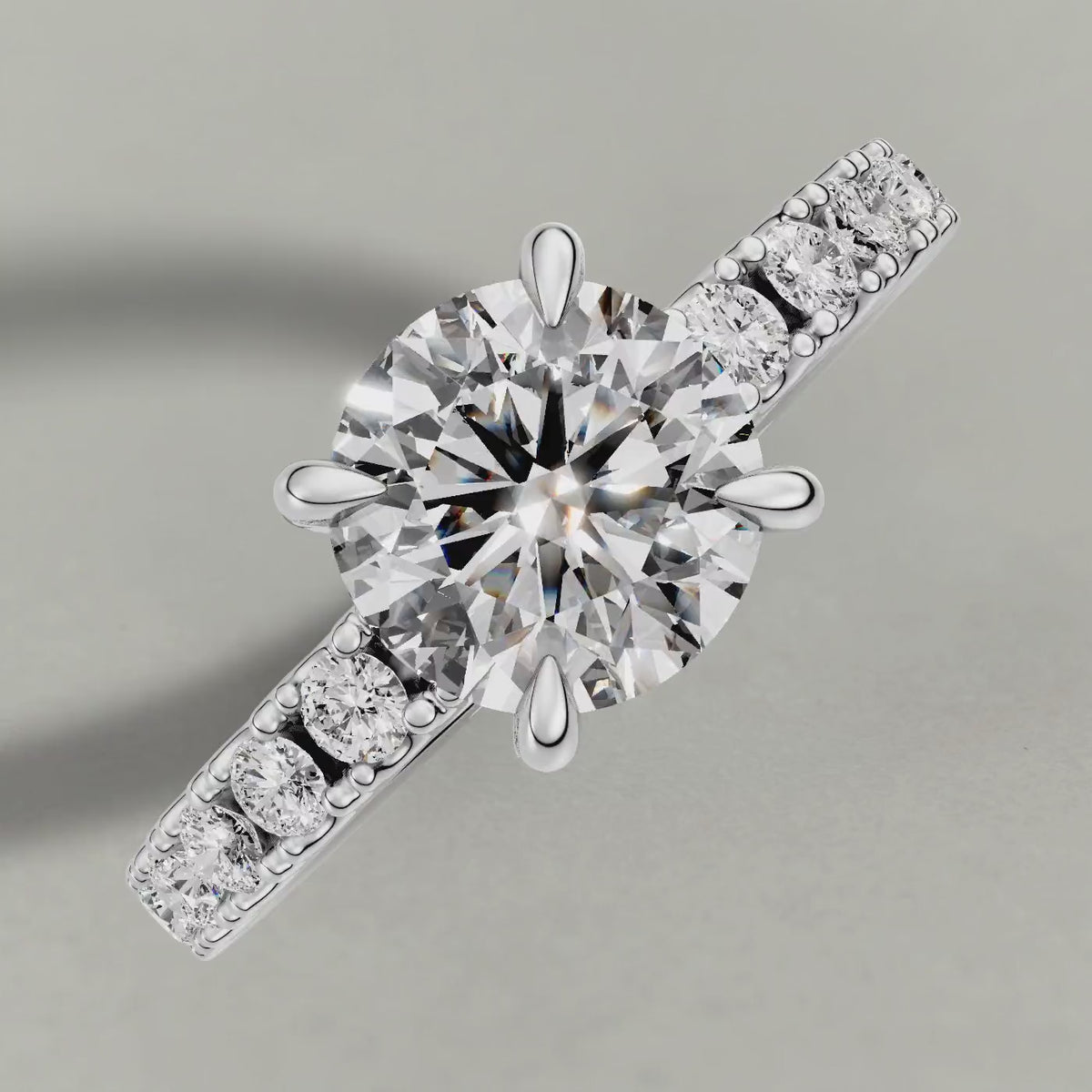 Rotating Shared-Prong Pavé Shoulder Engagement Ring (72222) in White Gold