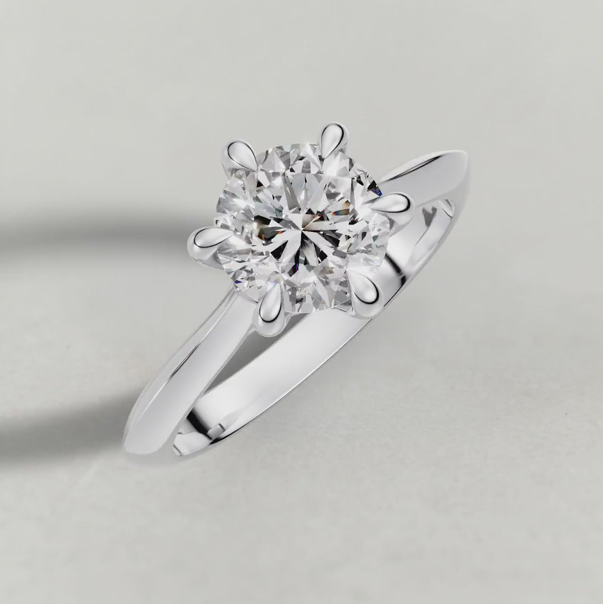 Rotating Curved Cathedral Solitaire Engagement Ring (72233) in White Gold
