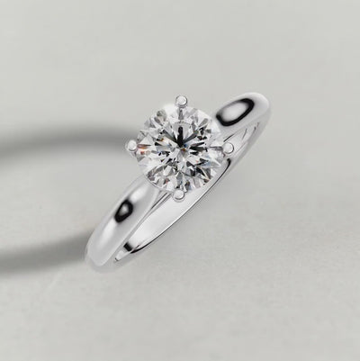 Rotating Tapered Four-Prong Solitaire Engagement Ring (70686) in White Gold