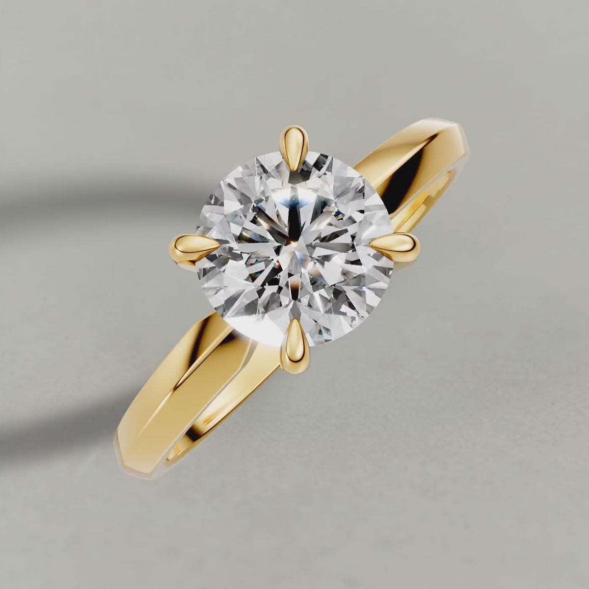 Rotating Knife-Edge Solitaire Engagement Ring (1113) in Yellow Gold