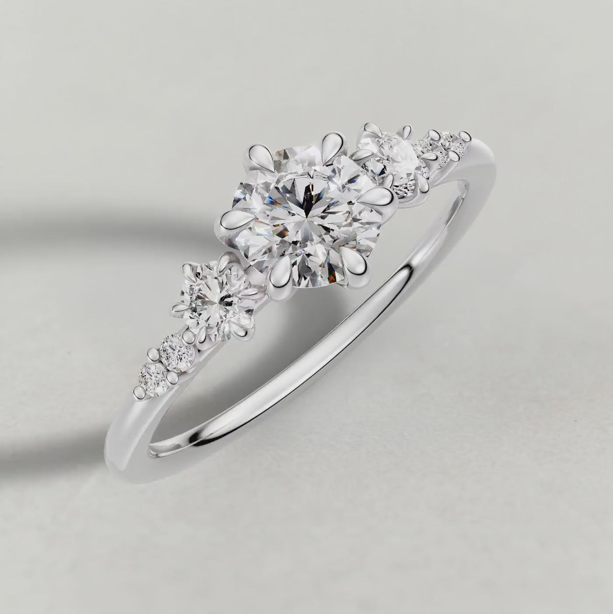 Rotating Graduated Side-Stone Engagement Ring (72084) in White Gold