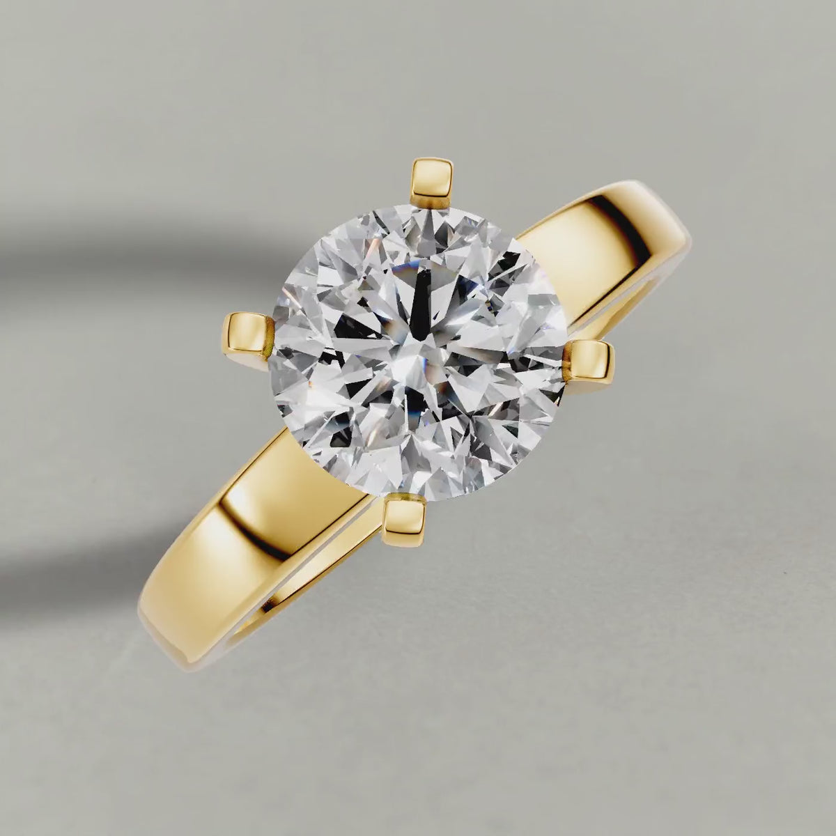 Rotating Tapered Solitaire Engagement Ring (2098) in Yellow Gold